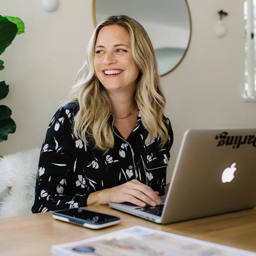 Sarah Dubbledam playing with her child